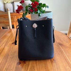 Kate Spade leather bag with shoulder strap.
